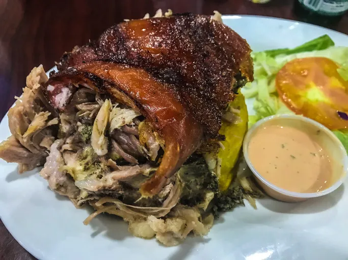 Pernil a slow cooked pork roast with mofongo